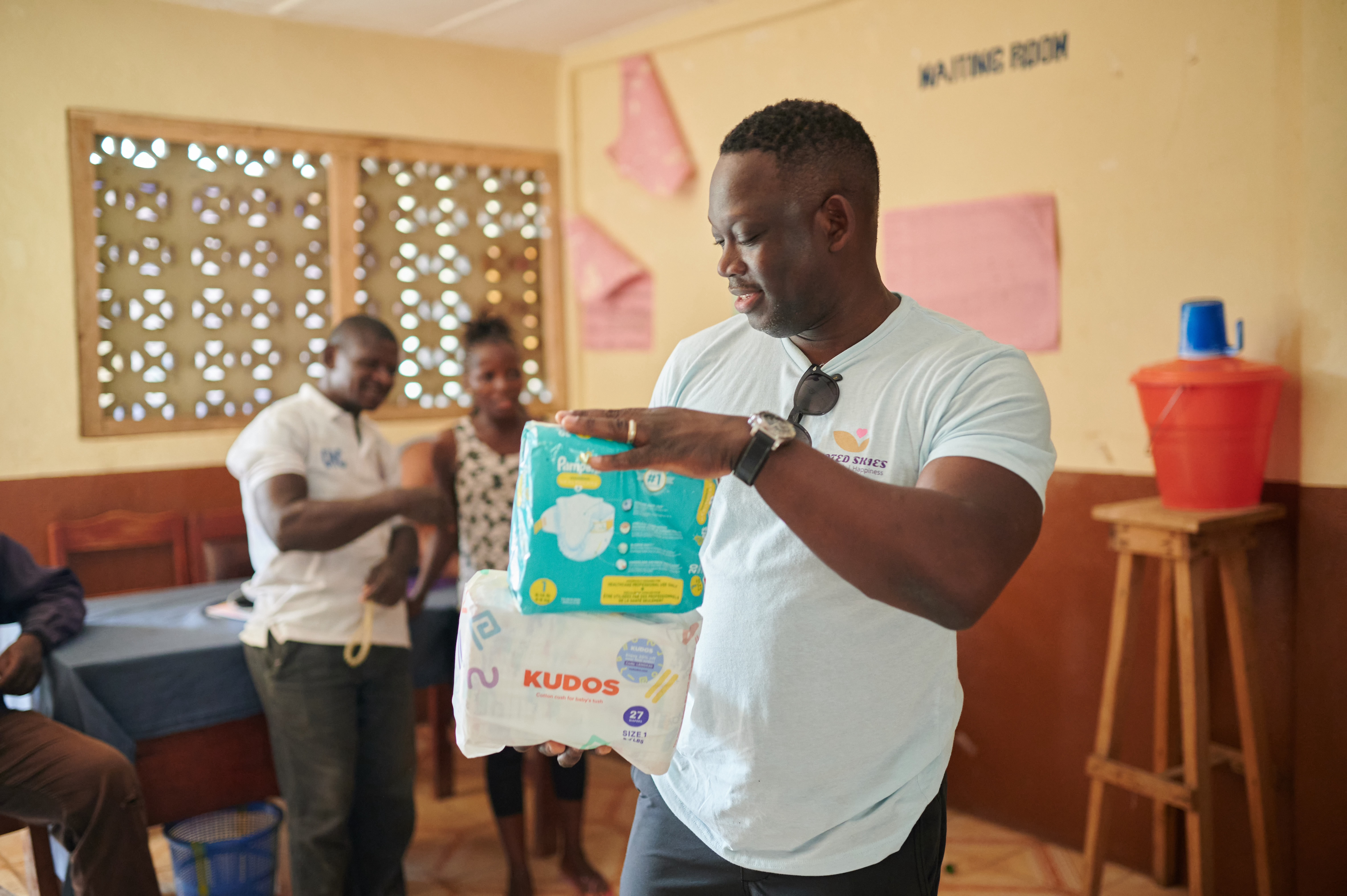 Devoted Skies volunteer distributing medical supplies at a clinic in Freetown, Sierra Leone